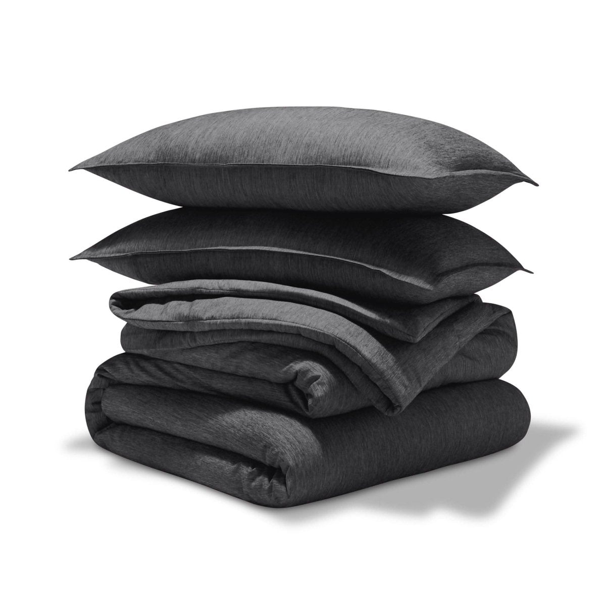 A comforter set folded and stacked