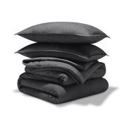 A comforter set folded and stacked