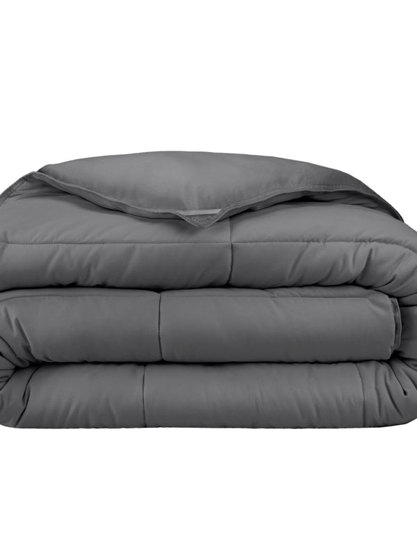 A grey duvet insert folded