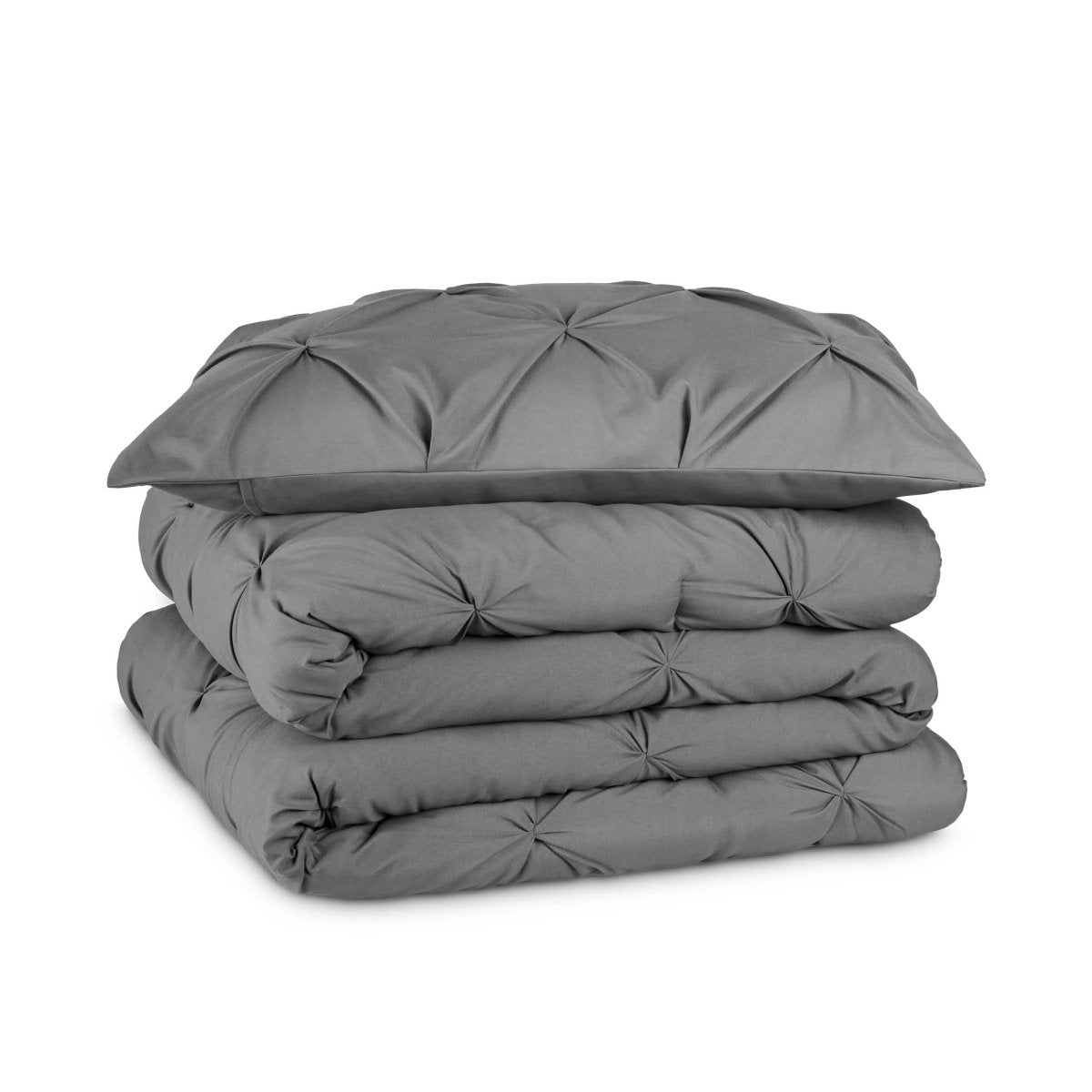 Grey pintuck comforter set folded and stacked
