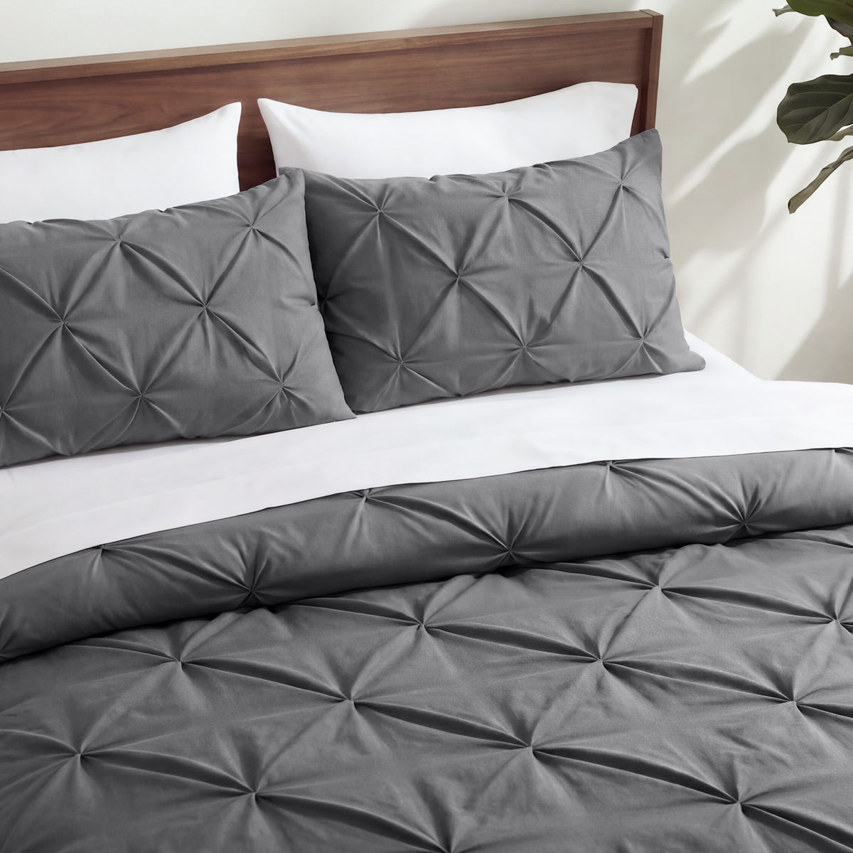 Close-up showing the pintuck detailing of the comforter set