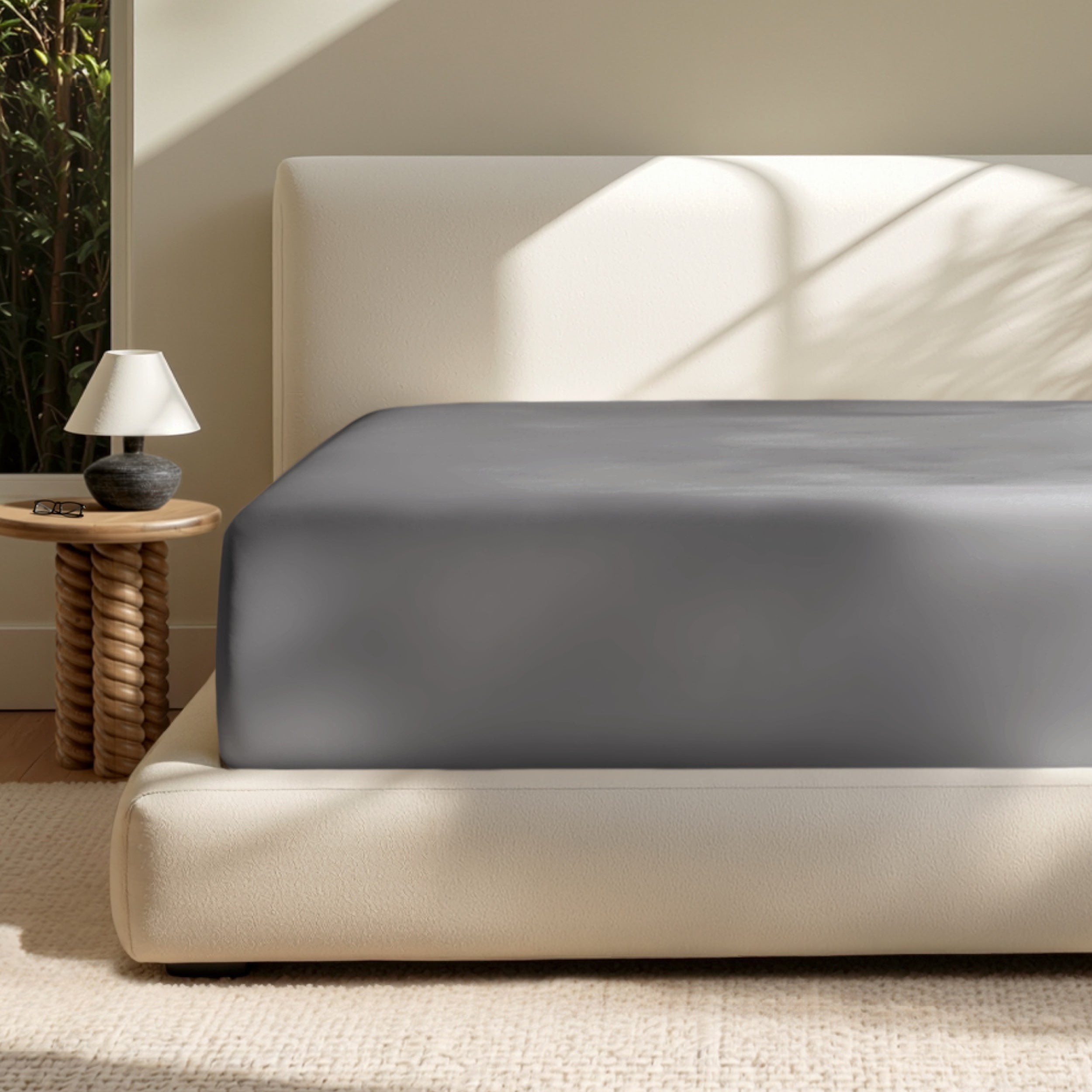 A deep pocket mattress with a fitted sheet on it