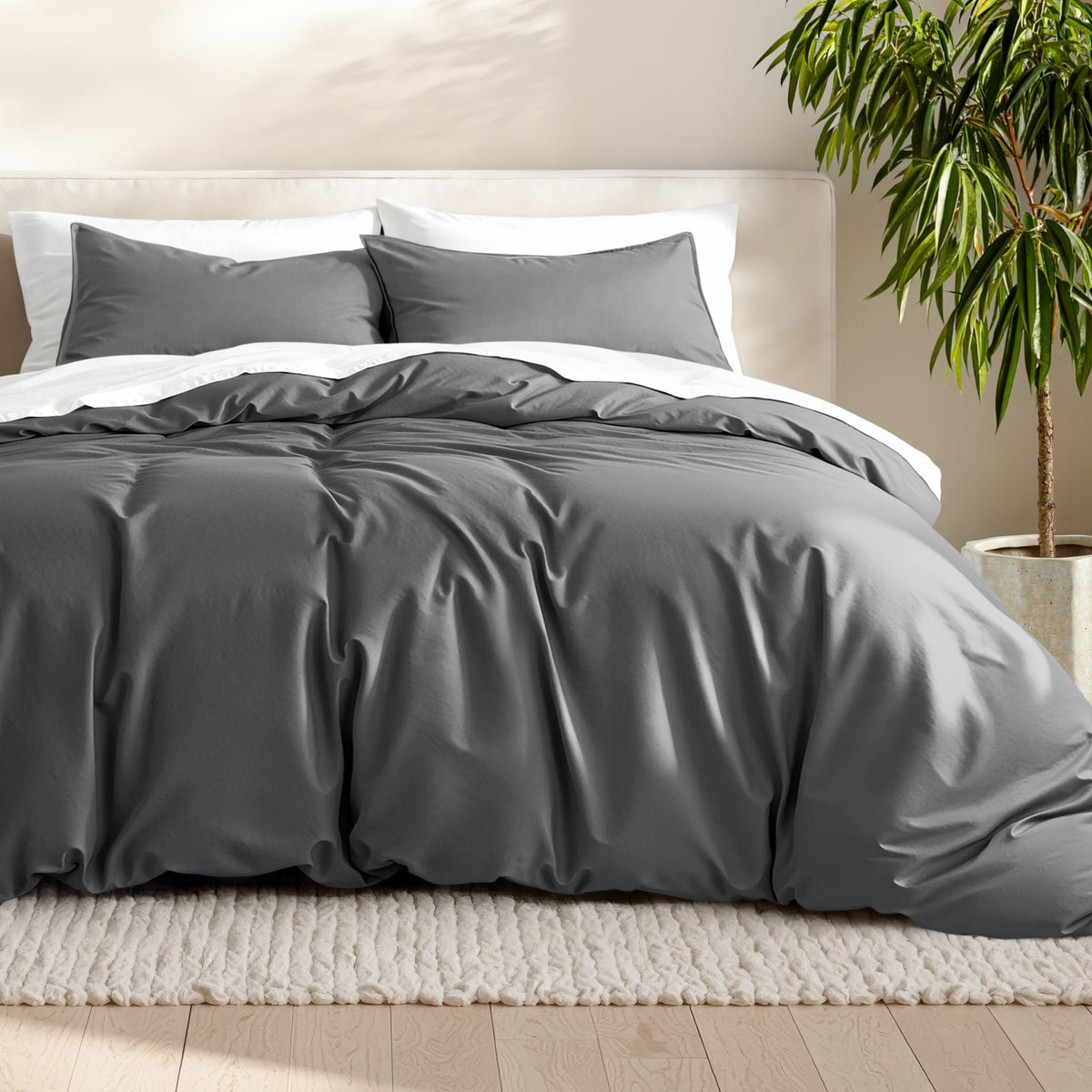 Microfiber bedding set on a bed with a neutral background
