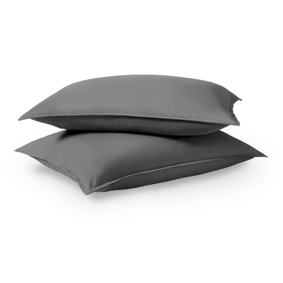 Two pillows stacked on a white background