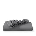 Microfiber fitted sheet folded with a white background