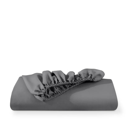 Microfiber fitted sheet folded with a white background