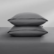 Two pillowcases on top of a bed
