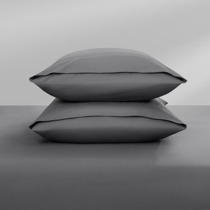 Two pillowcases on top of a bed