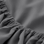 Close-up of elastic on a fitted sheet.