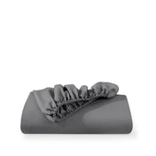 Grey fitted sheet on a white background