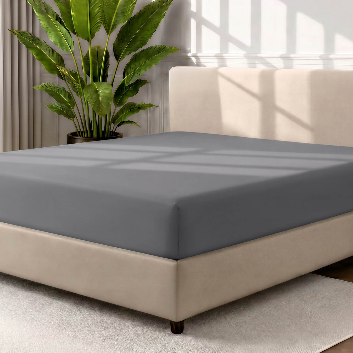 Ultra soft fitted sheet on a mattress with the sun shining into the bedroom