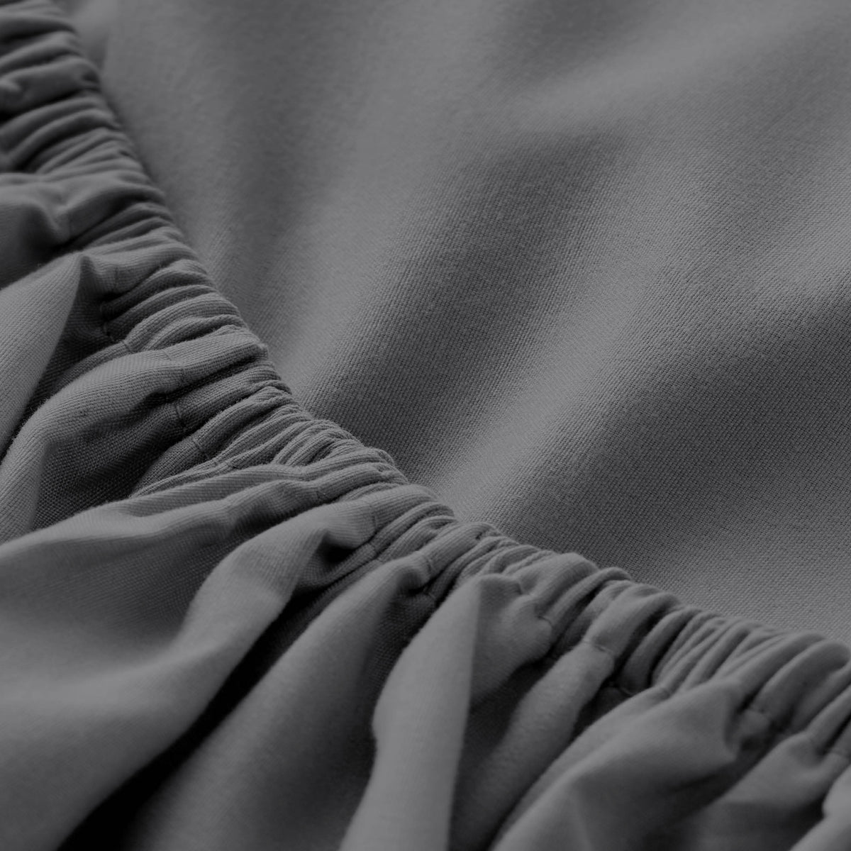 Close-up of fitted sheet with all around elastic