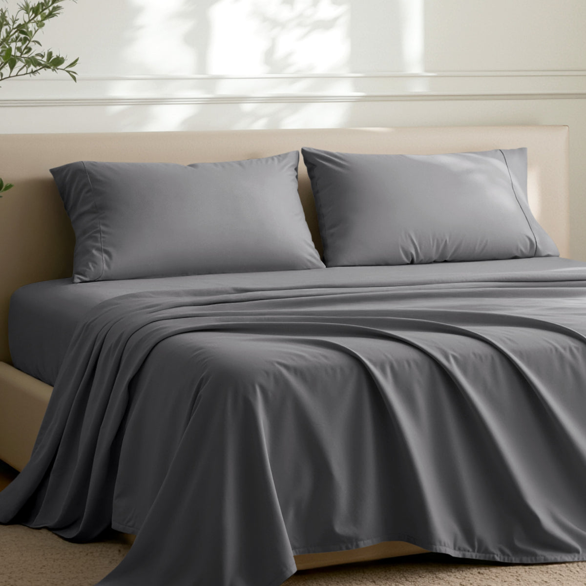 2 pillowcases on pillows on a nicely made bed