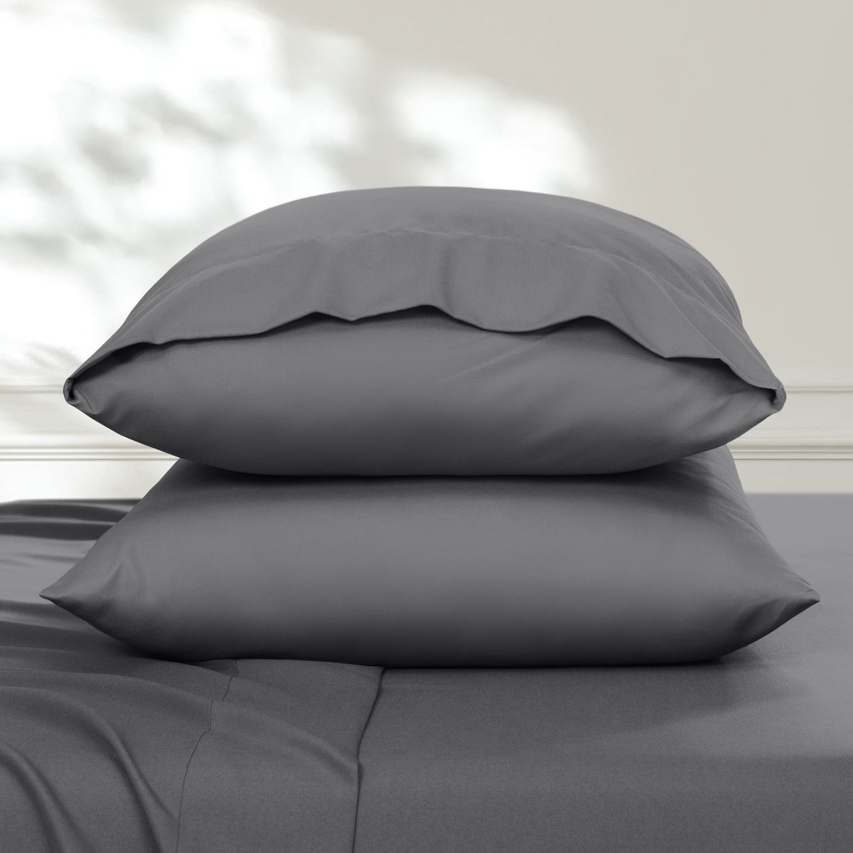 2 pillowcases on pillows