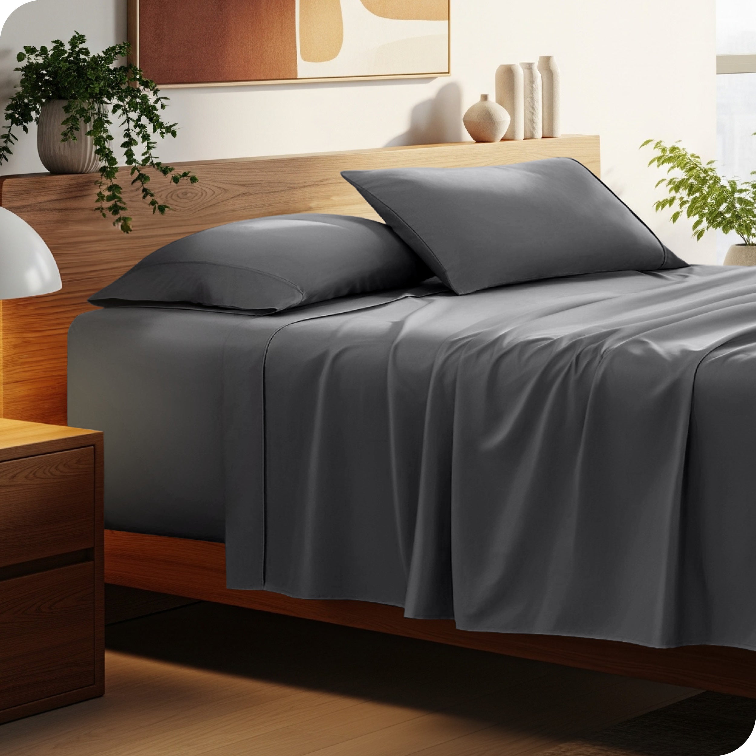 Bed with microfiber bedding and wooden headboard in a bedroom setting