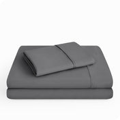 Microfiber sheet set folded and stacked neatly.