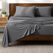 Bed sheets on a wooden bed in a bedroom setting