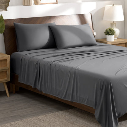 Bed sheets and pillows on a bed in a bedroom setting.