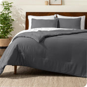 A comforter set on a bed