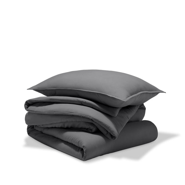 A comforter set folded and stacked