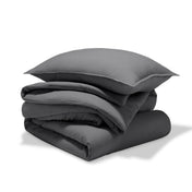 A comforter set folded and stacked
