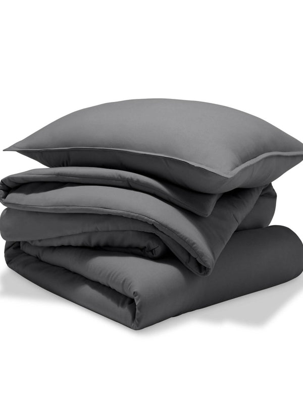 A comforter set folded and stacked