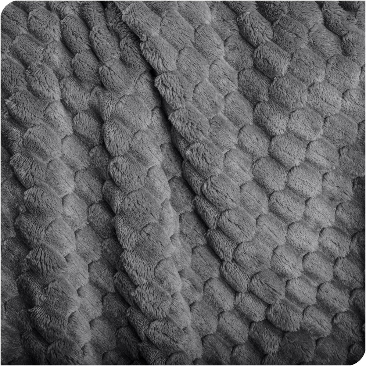Close up of microplush waffle textured blanket