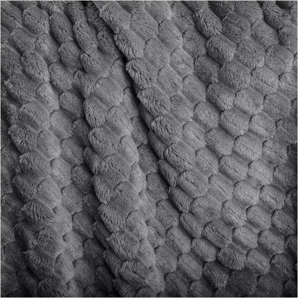 Close up of microplush waffle textured blanket