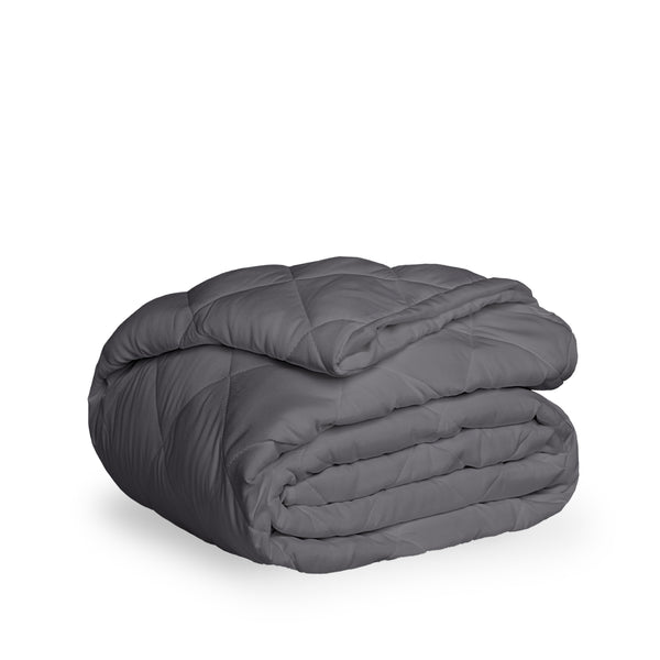 A grey quilted mattress pad