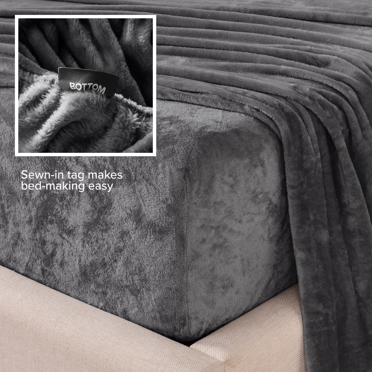 Close-up of the corner of a bed made with microplush sheets