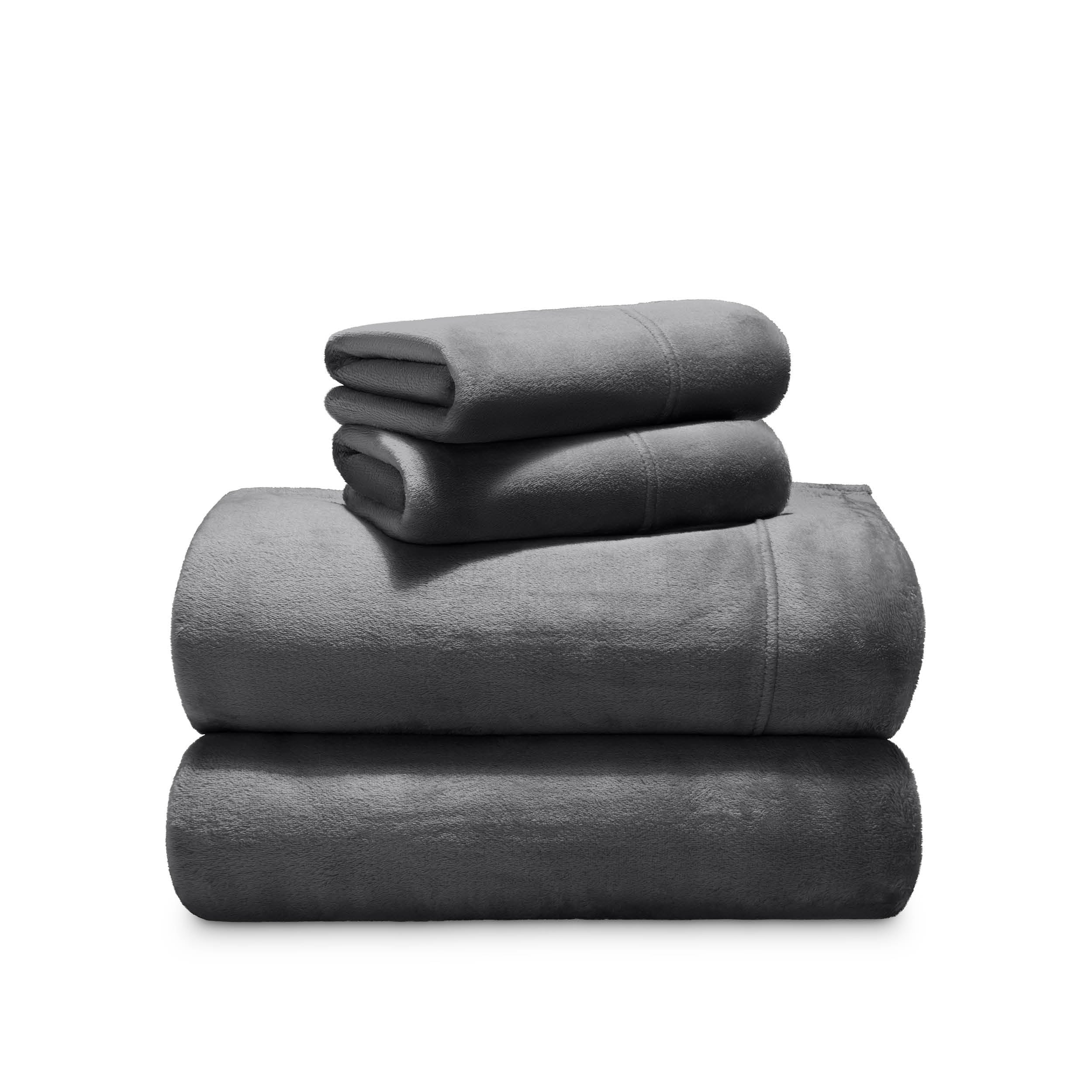 Stack of microplush sheets on a white background