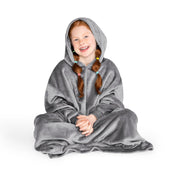 A child has a hooded microplush wearable blanket on