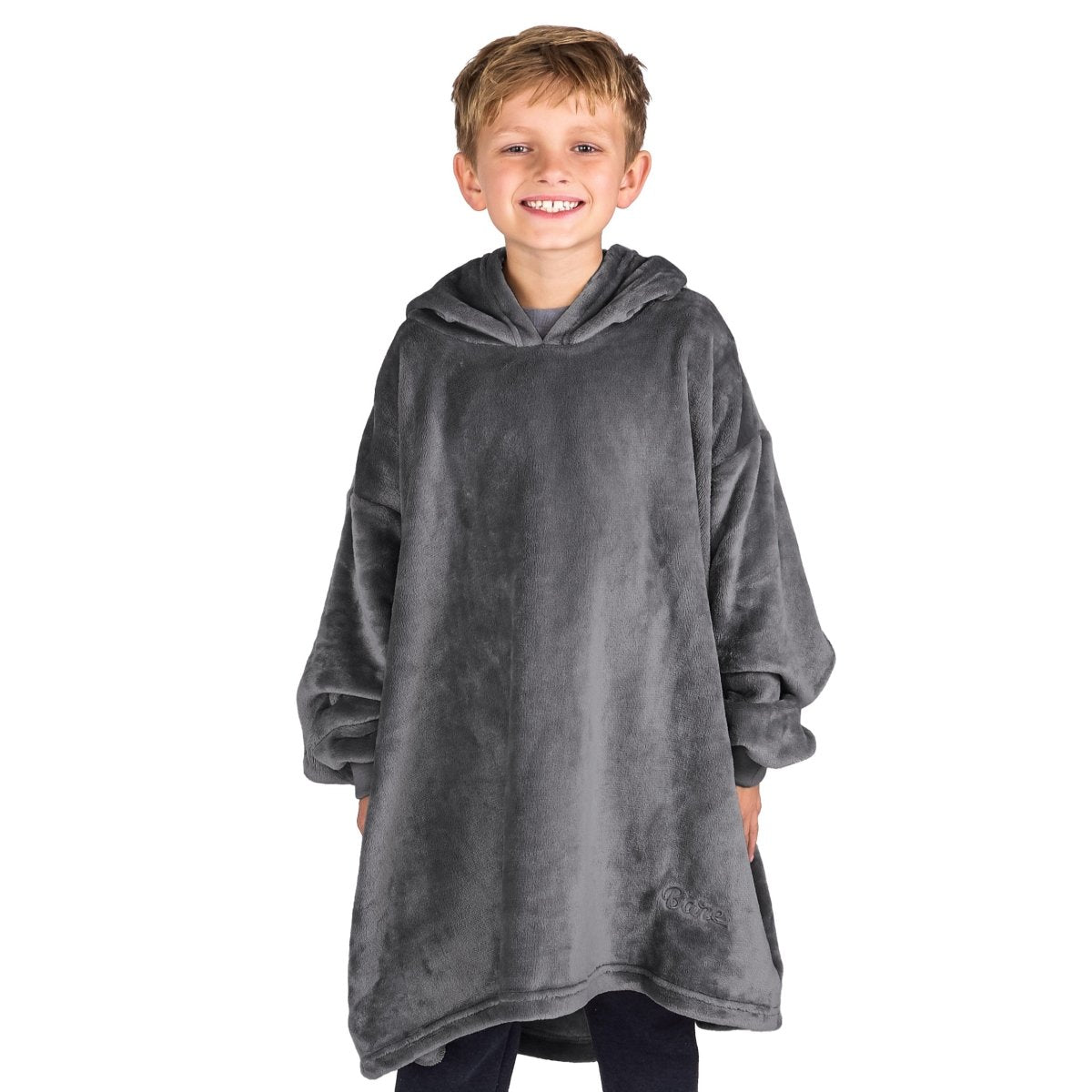 A boy dressed in a microplush wearable blanket.