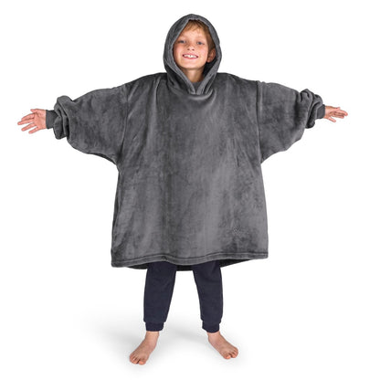 A boy wearing a cozy hooded blanket.