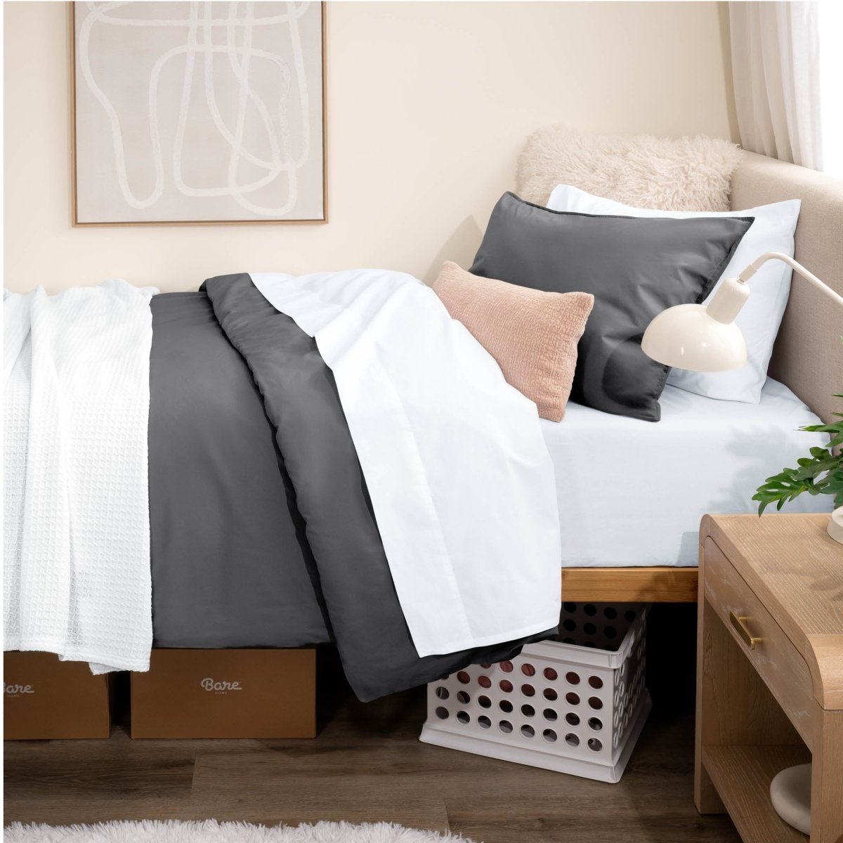 Bed with percale bedding in a dorm room setting