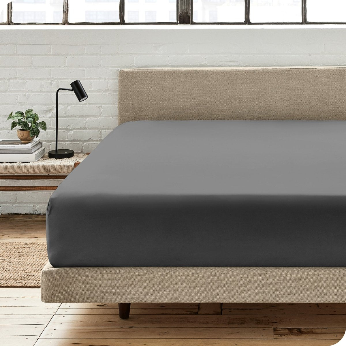 Modern bedroom with a fitted sheet which fits deep mattresses up to 15 inches