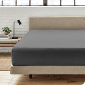 Modern bedroom with a fitted sheet which fits deep mattresses up to 15 inches