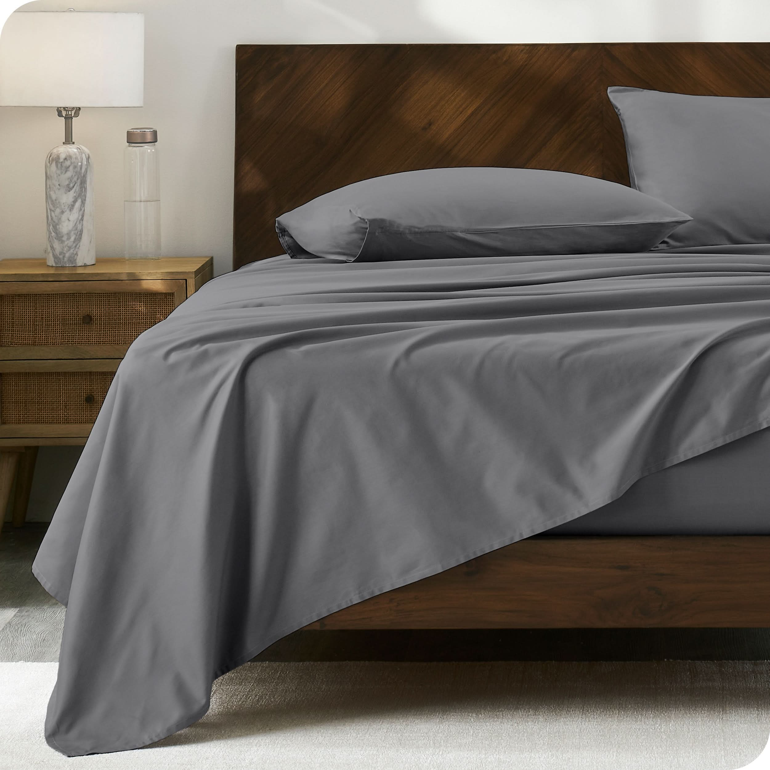 Modern wood bed made with percale sheet set