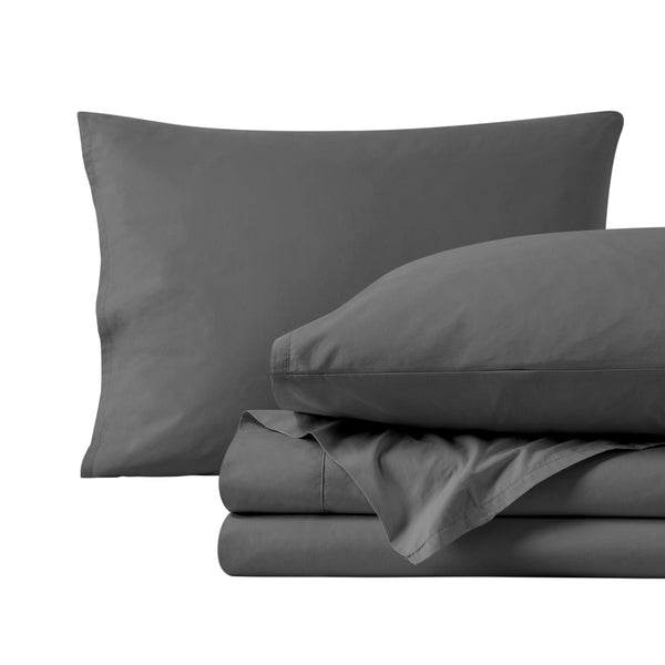 Percale sheets folded and matching pillowcases with pillows in them