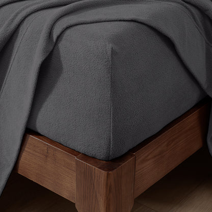 Fitted sheet on a wooden bed frame