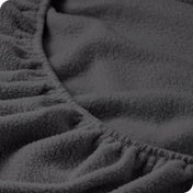 Close up of the elastic portion of a fleece fitted sheet