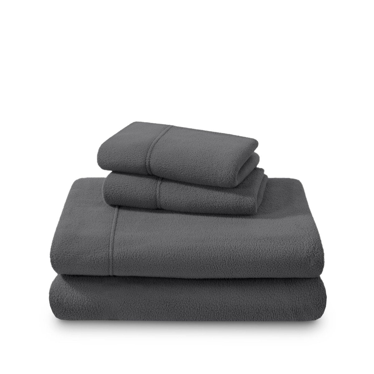 Polar fleece sheets and pillowcases folded and stacked on a white background