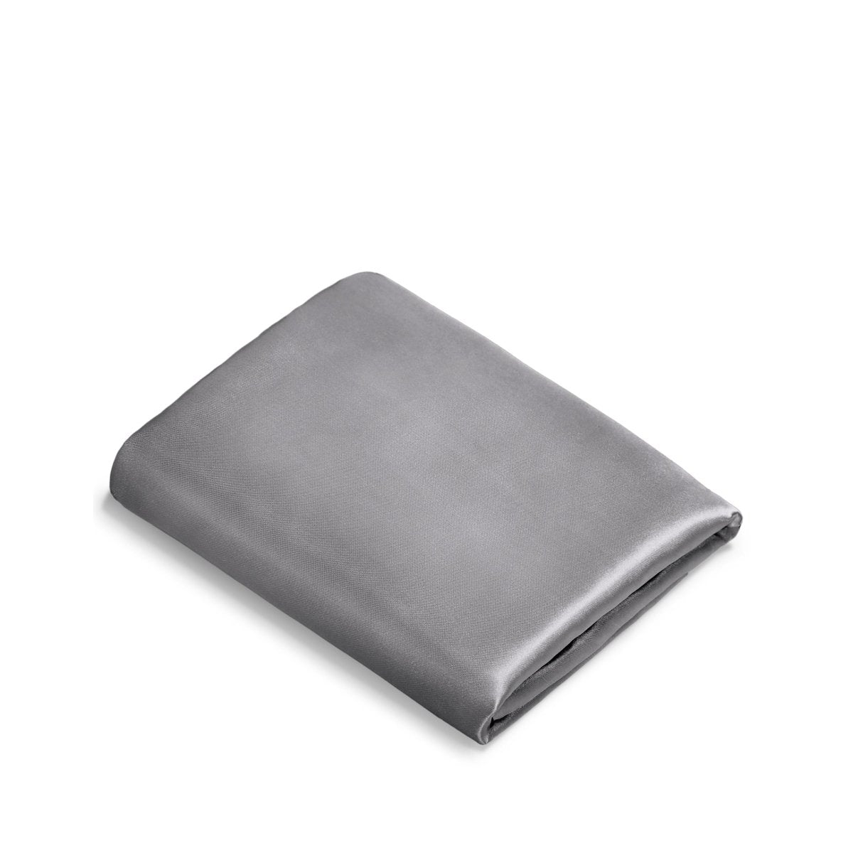 Folded satin pillowcase on a white background