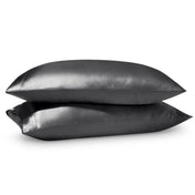 2 satin pillowcases on pillows stacked