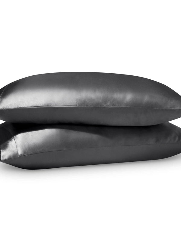 2 satin pillowcases on pillows stacked