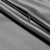 Close-up of poly satin pillowcase with a zipper