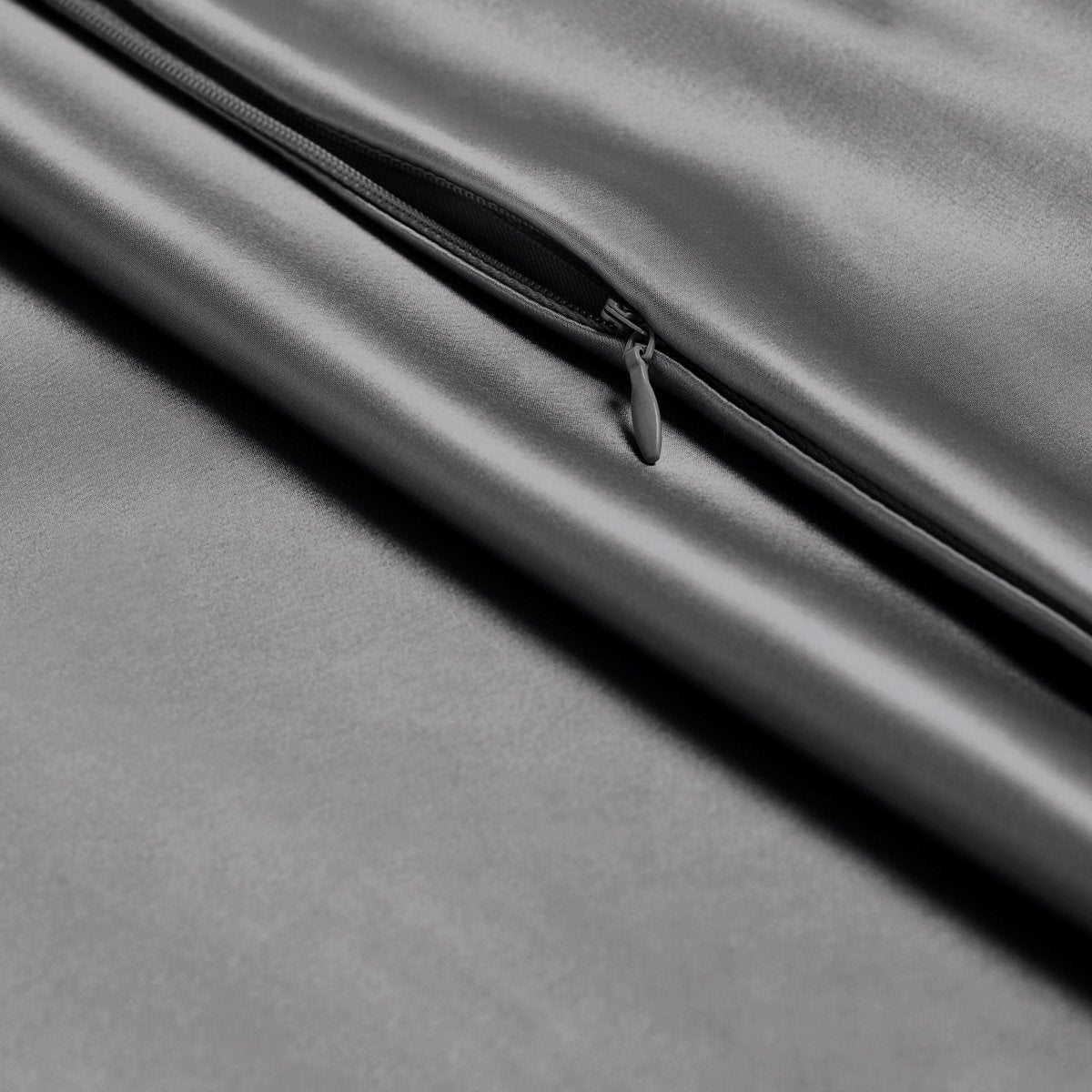 Close-up of poly satin pillowcase with a zipper