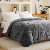 Shaggy duvet cover on a bed in a bedroom setting with shelves and decor.