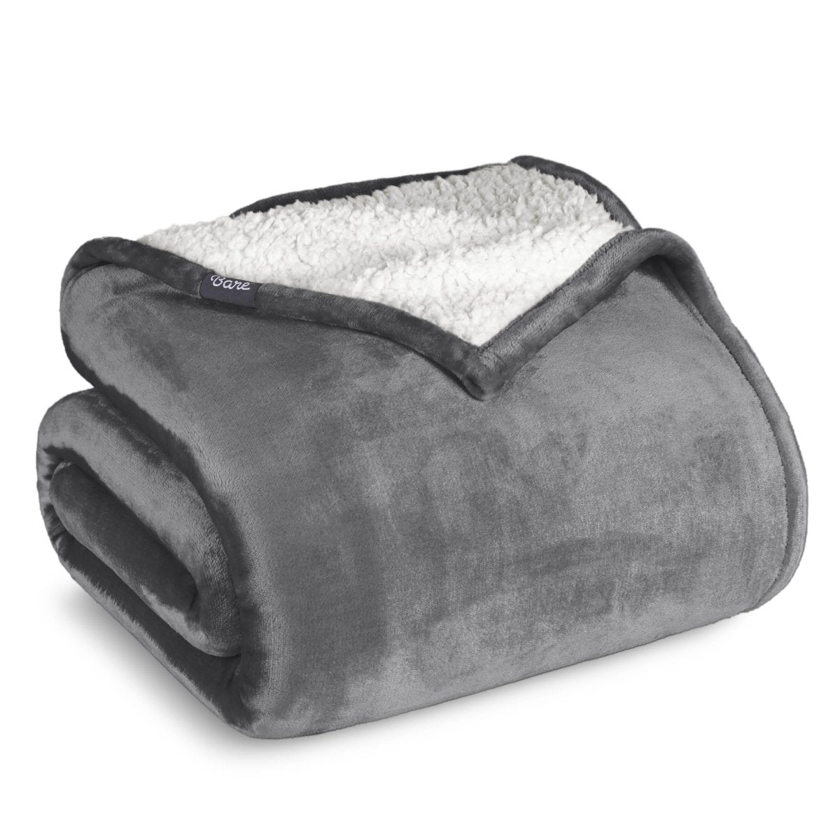 A sherpa blanket folded neatly while showing both sides