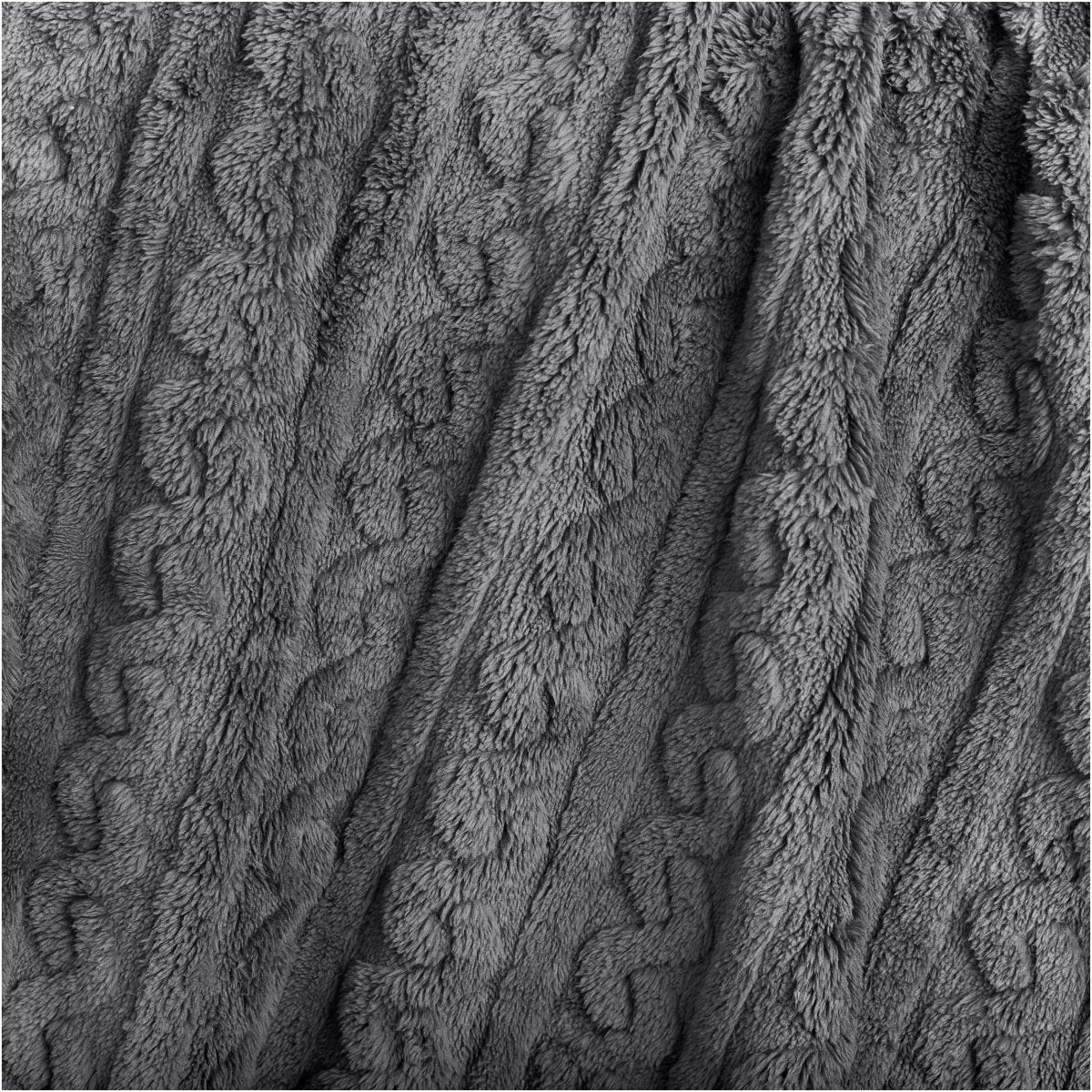 Close up of the textured cable knit blanket